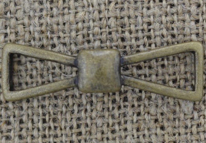  11288 Element ozdobny łącznik kokardka w kolorze brązu