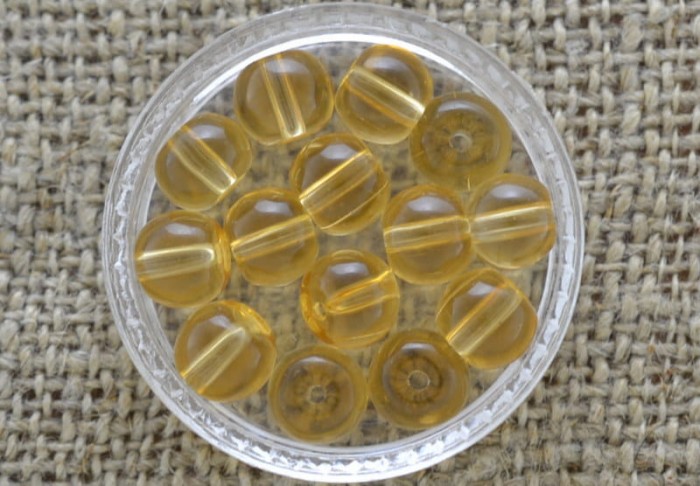 71230 Koralik szklany perełka gładka transparentna 6mm herbaciana 20szt