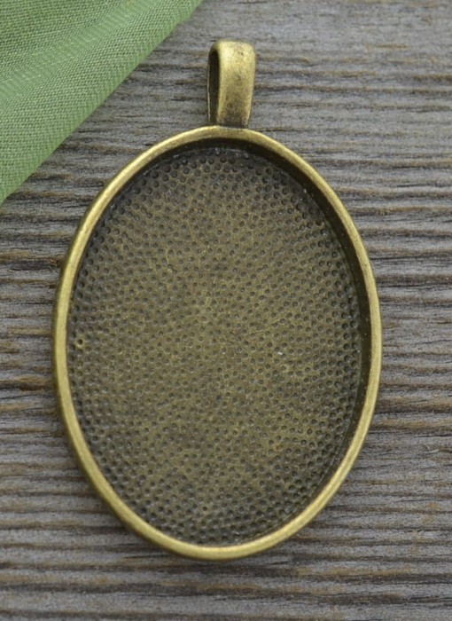 101118 Klasyczna baza medalionu w kolorze brązu na kaboszon 30x22mm