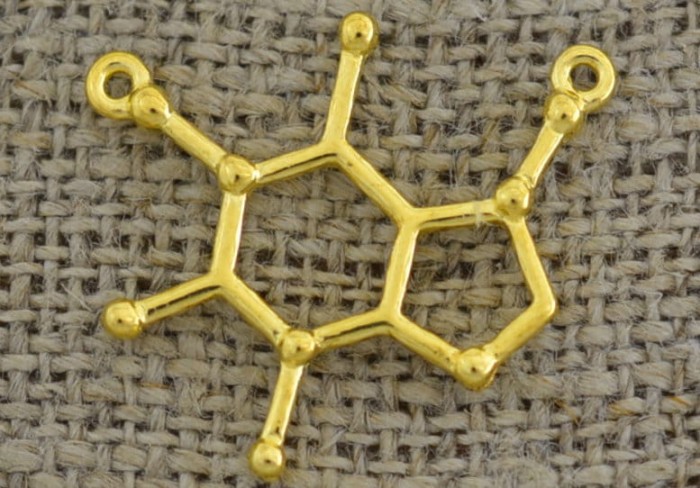[212106] Element ozdobny związek chemiczny w kolorze złotym