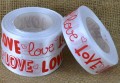 [8z25007] Wstążka satynowa z nadrukiem "LOVE" biała 25mm 22mb