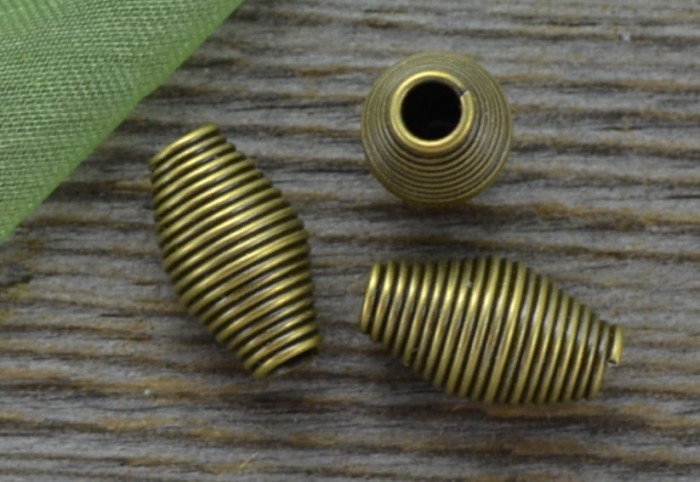 11267 Element ozdobny sprężynka w kolorze brązu