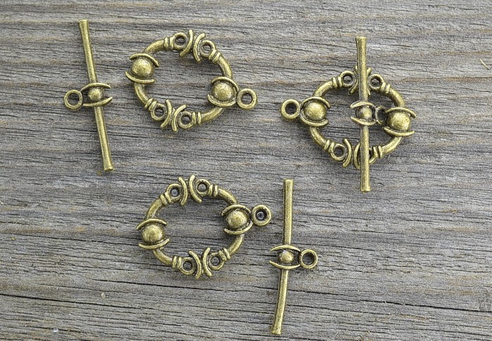 11532 Zapięcie ozdobne amerykańskie owalne w kolorze brązu