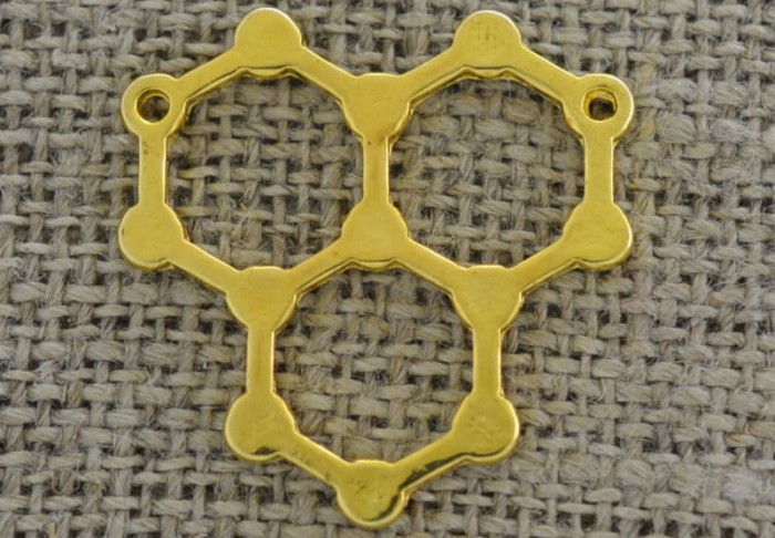 [212102] Element ozdobny łącznik w kolorze złotym