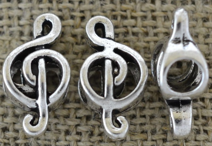 312156 Koralik modułowy klucz wiolinowy w kolorze srebrnym