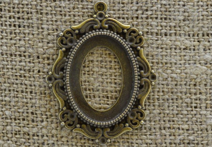 10113 Ozdobna baza medalionu w kolorze brązu na kaboszon 27*20mm