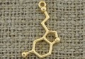 [207149] Zawieszka mała związek chemiczny w kolorze złotym 