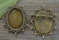 10244 Ozdobna baza broszki w kolorze brązu na kaboszon 25x18mm