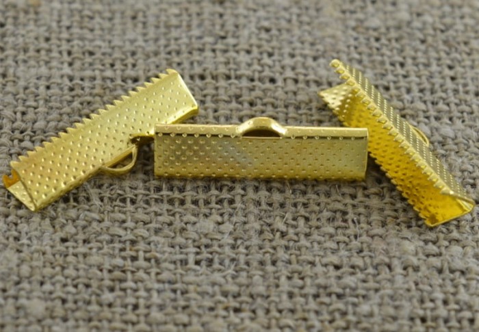  27129 Końcówka wstążki w kolorze złotym 25*7mm 4szt