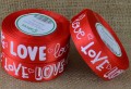 [8z25010] Wstążka satynowa z nadrukiem "LOVE" czerwona 25mm 22mb
