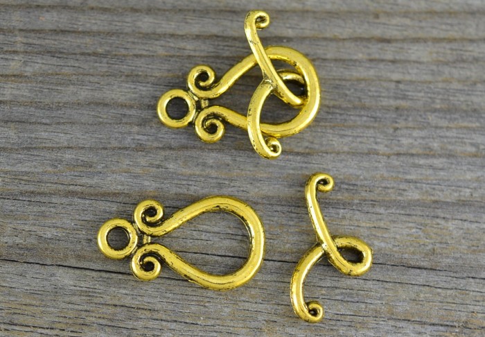 21506 Zapięcie ozdobne amerykańskie owalne w kolorze złota