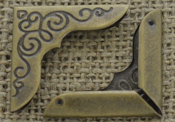 [k0514] Narożnik do książki w kolorze brązu 23*23mm