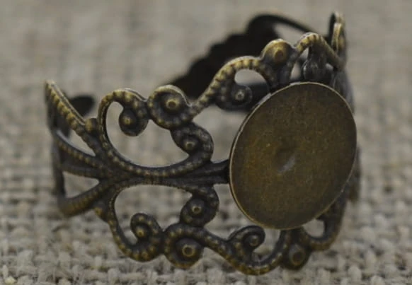 [10366] Ozdobna baza pierścionka w kolorze brązu na kaboszon 10mm