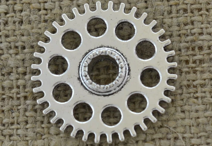 [312226] Element ozdobny steampunk tryb w kolorze srebrnym 26mm