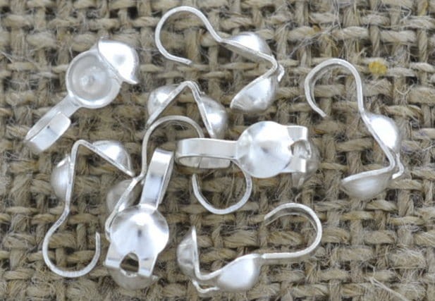 571103 Łapaczki męskie w kolorze srebrnym 9*3mm 50szt