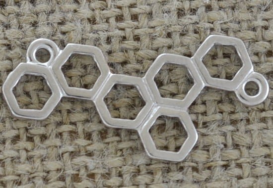 [312236] Element ozdobny związek chemiczny srebrny