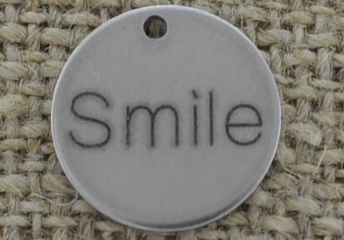 Zawieszka ze stali nierdzewnej moneta "Smile"