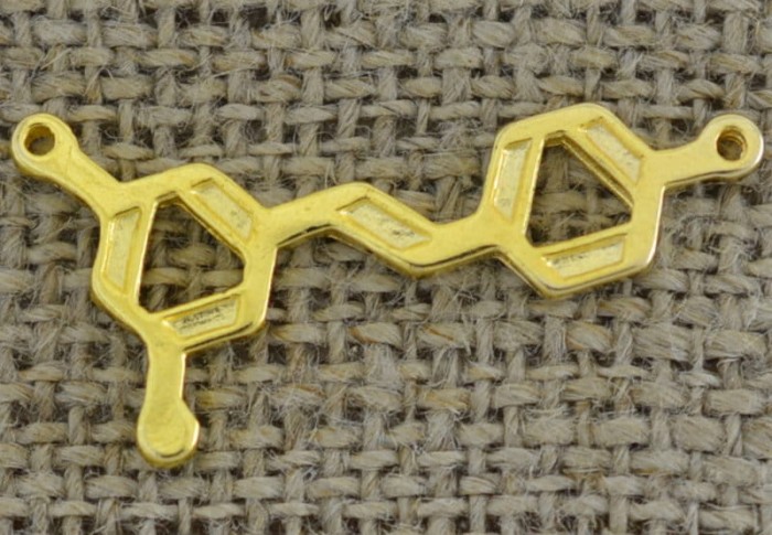 [212105] Element ozdobny związek chemiczny w kolorze złotym