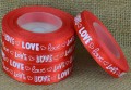 [8z12010] Wstążka satynowa z nadrukiem "LOVE" czerwona 12mm 22mb