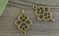 10792 Element ozdobny łącznik spiralki w kolorze brązu 2szt 