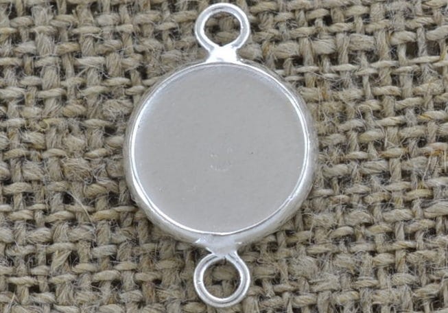 30166 Klasyczna baza łącznik w kolorze srebra na kaboszon 12mm 2szt