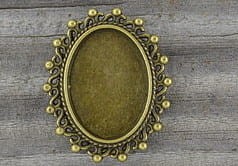 10204 Ozdobna baza broszki w kolorze brązu na kaboszon 25*18mm