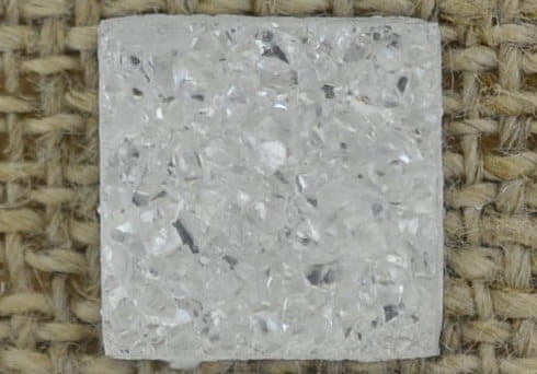  [04641] Kaboszon brokatowy druzy biały 12*12mm