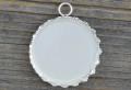  50115 Ozdobna baza medalionu w kolorze srebrnym na kaboszon 25mm