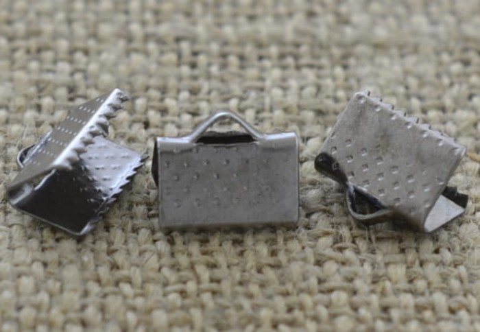 [571137] Końcówka wstążki w kolorze srebrnym 10*8mm 10szt