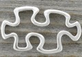312128 Element ozdobny łącznik puzzle 30*18mm