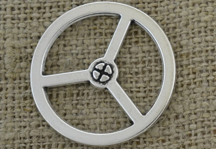 [312229] Element ozdobny steampunk tryb w kolorze srebrnym 34mm