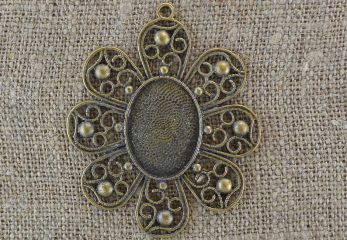 101155 Ozdobna baza w kolorze brązu na kaboszon 30*22mm