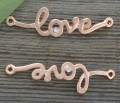 -1205  Element ozdobny napis love z cyrkonią w kolorze różowego złota