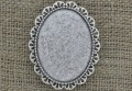50218 Ozdobna baza broszki w kolorze srebrnym na kaboszon 40*30mm