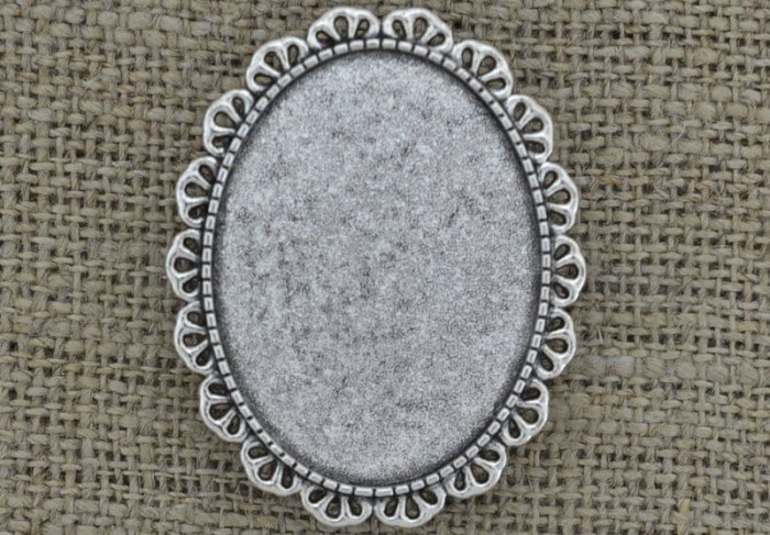 50218 Ozdobna baza broszki w kolorze srebrnym na kaboszon 40*30mm