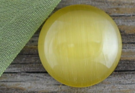  04699 Kaboszon szklany kocie oko 14mm słomkowy 2szt