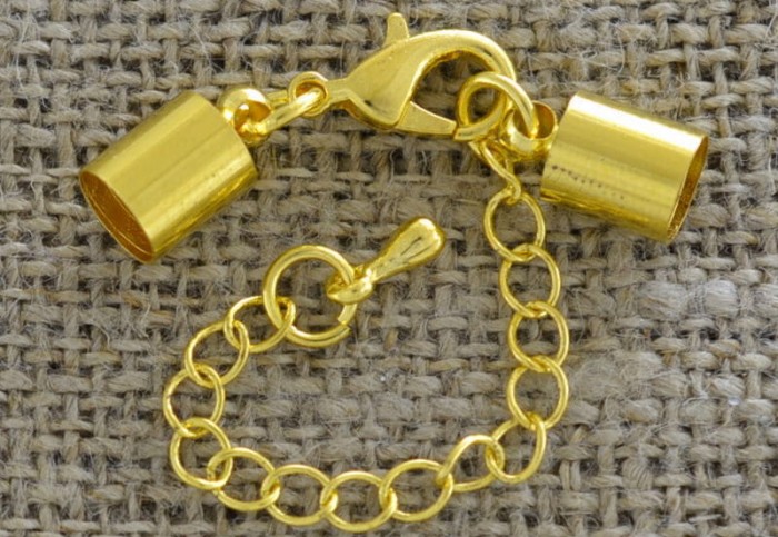 27138 Klasyczna końcówka do wklejania z karabińczykiem 5,5mm w kolorze złotym