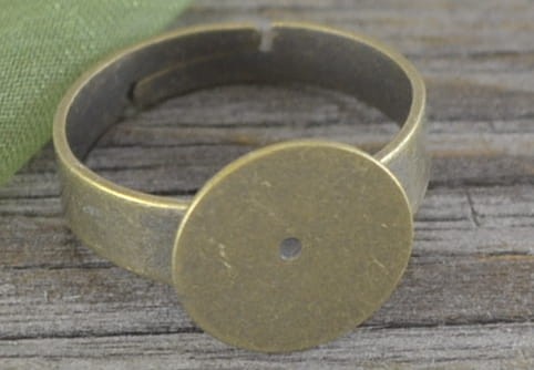  10354 Klasyczna baza pierścionka w kolorze brązu z płaską tarczą 12mm