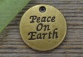 107234 Zawieszka mała moneta Peace on Earth w kolorze brązu