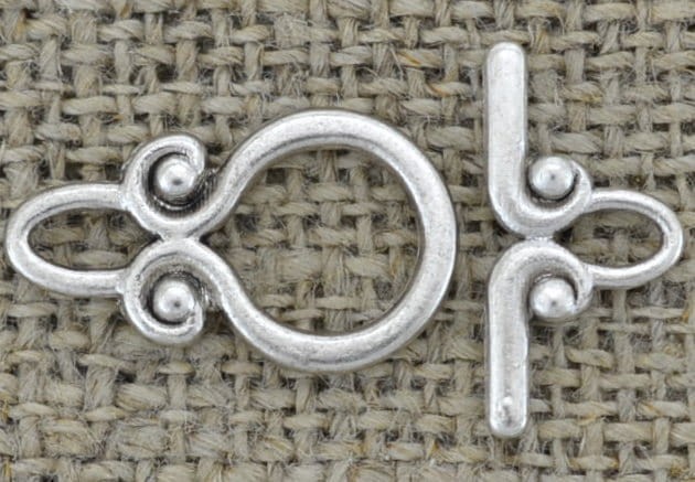  {31506} Zapięcie ozdobne przekładane w kolorze srebrnym