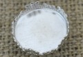  31835 Ozdobny nap na kaboszon 18mm w kolorze srebrnym