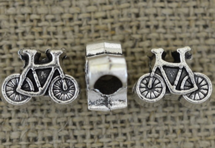 312163 Koralik modułowy rower w kolorze srebrnym