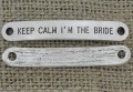 [312180] Element ozdobny łącznik "KEEP CALM I ' M THE BRIDE" w kolorze srebrnym