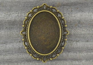10205 Ozdobna baza broszki w kolorze brązu na kaboszon 25*18mm 