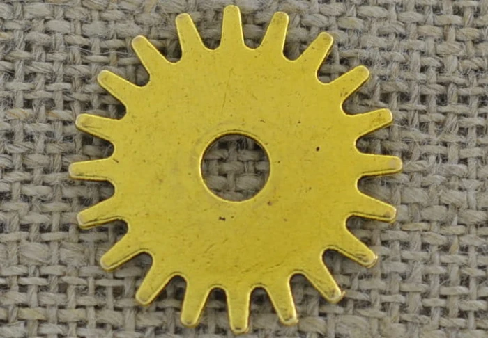 [212103] Element ozdobny tryb w kolorze złotym 25mm