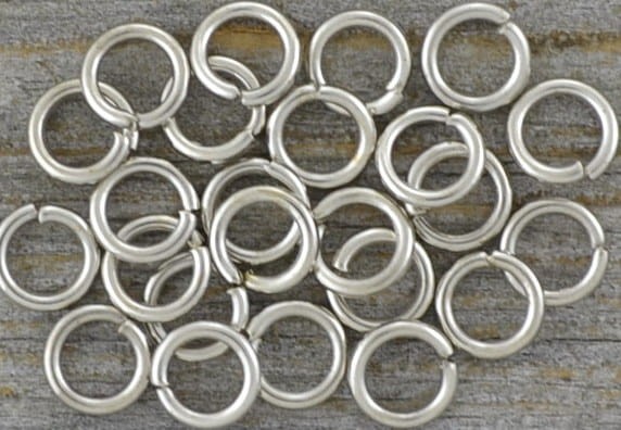 301009 Ogniwka otwarte okrągłe 4mm w kolorze srebra 200szt
