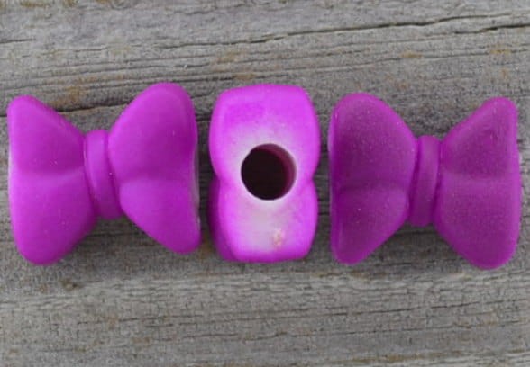 702454 Koralik akrylowy kokardka 15*14mm fioletowa