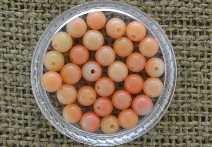 601244 Turkus syntetyczny kula 4mm w kolorze brzoskwiniowym 7szt