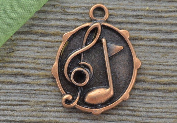 -0708 Zawieszka mała moneta z nutką w kolorze miedzi