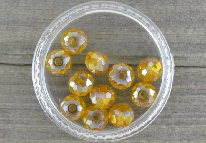 90140 Koraliki szklane fasetowane miodowe 6mm 12sztuk